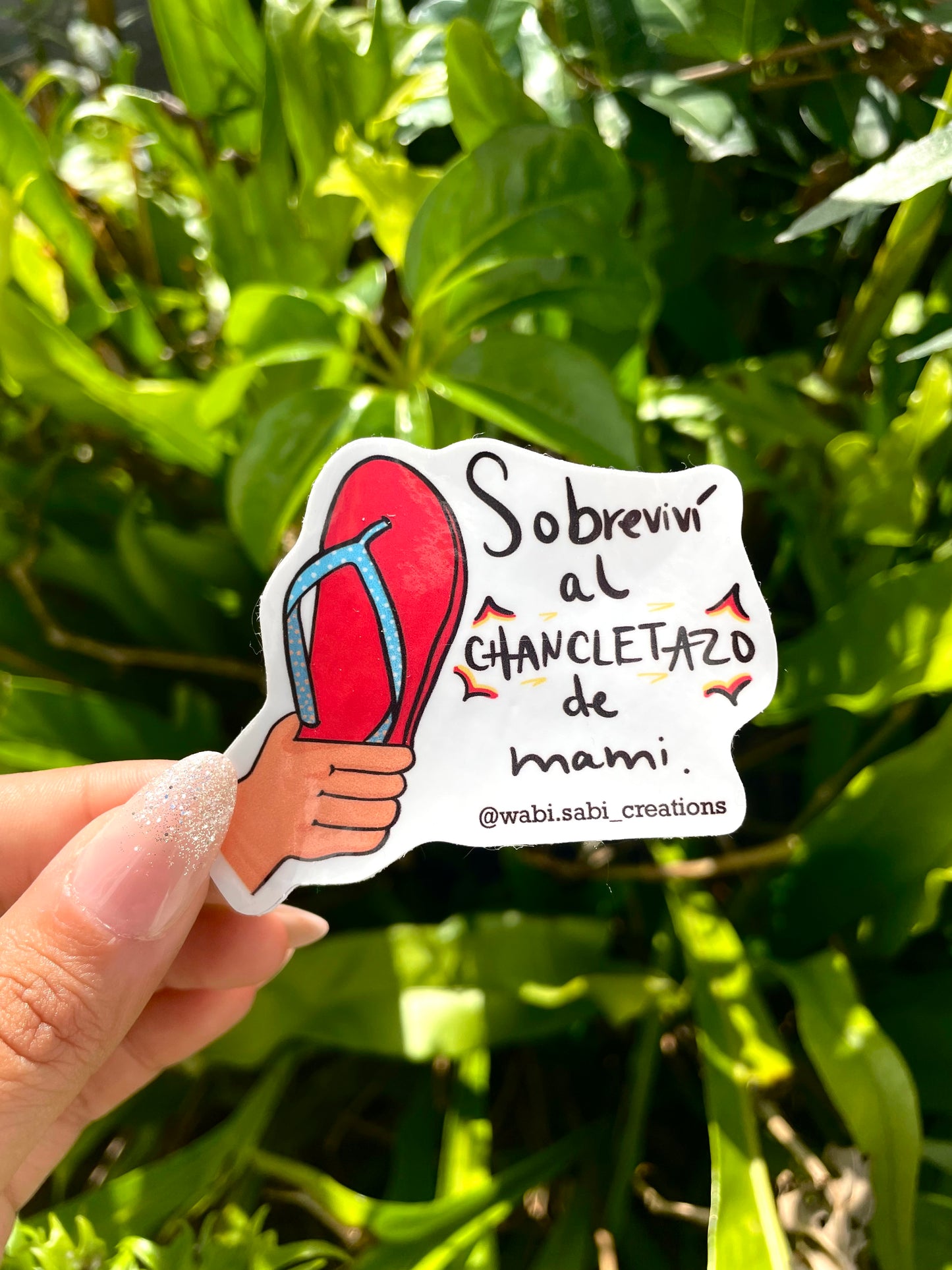 “Sobreviví al chancletazo de mami” sticker