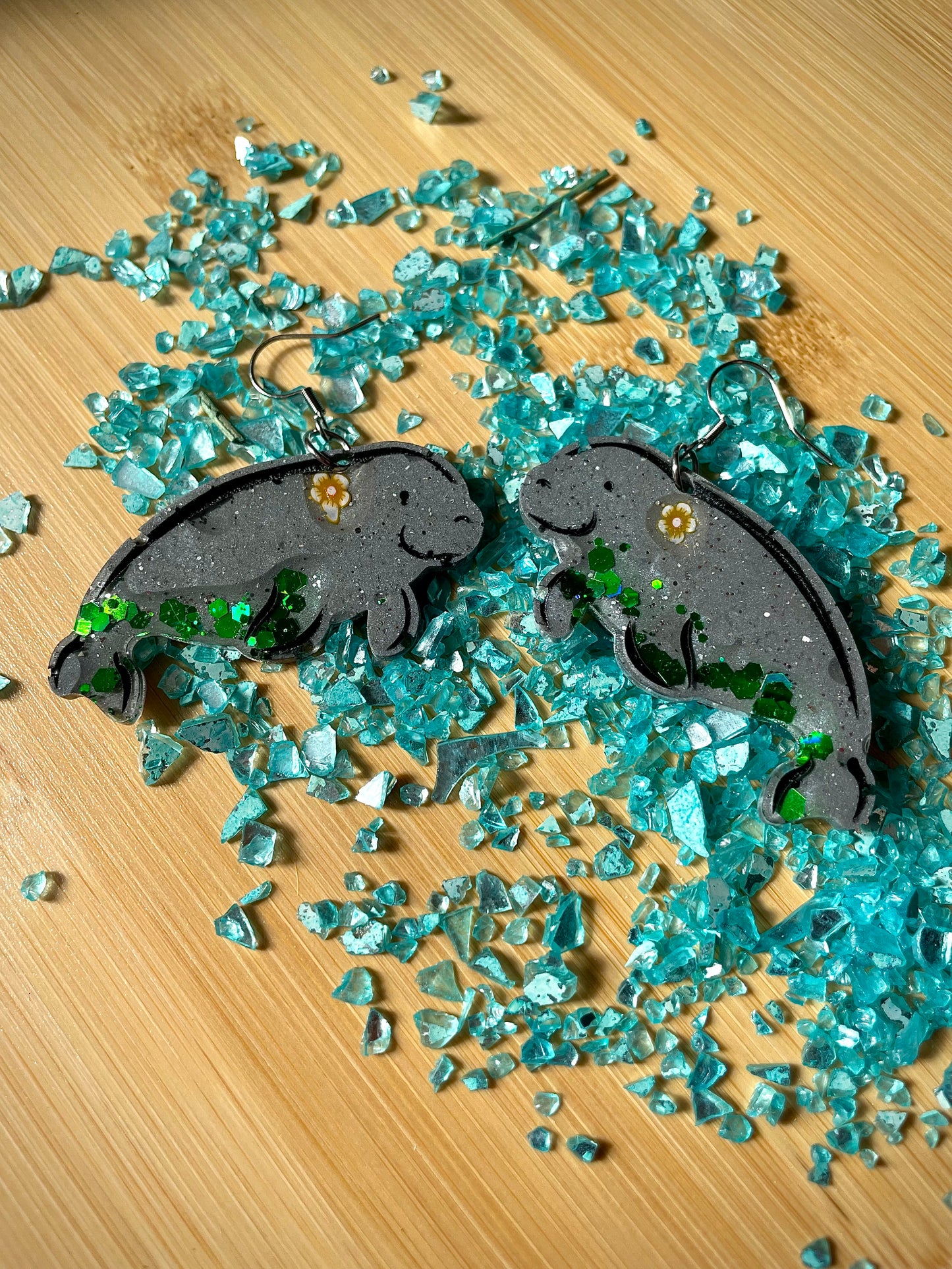 Manatee resin earrings