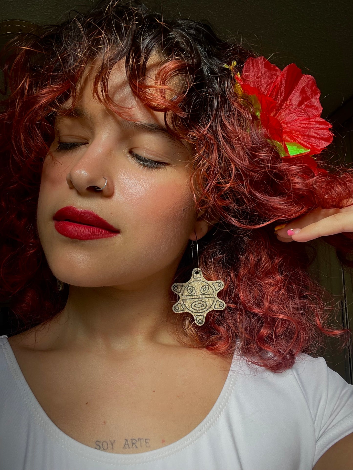 “Sol taíno” resin earrings