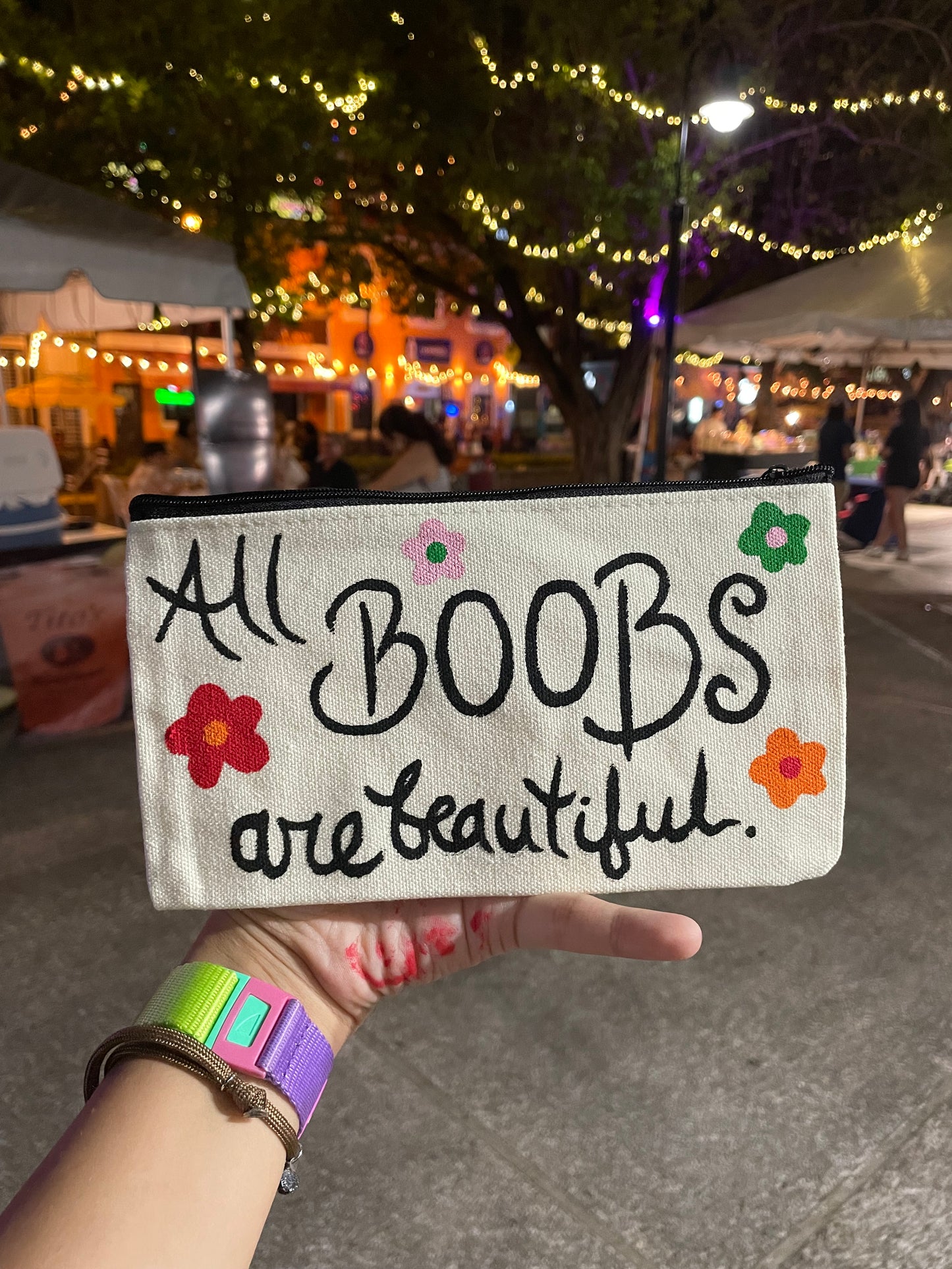 “All boobs are beautiful” painted bag