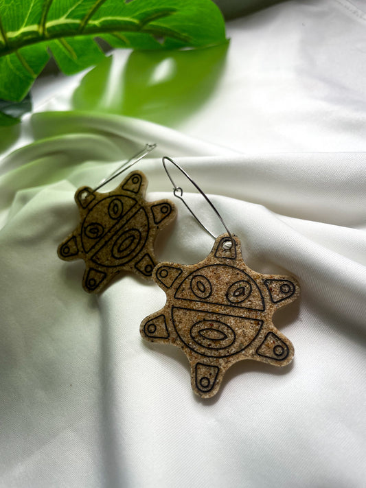 “Sol taíno” resin earrings