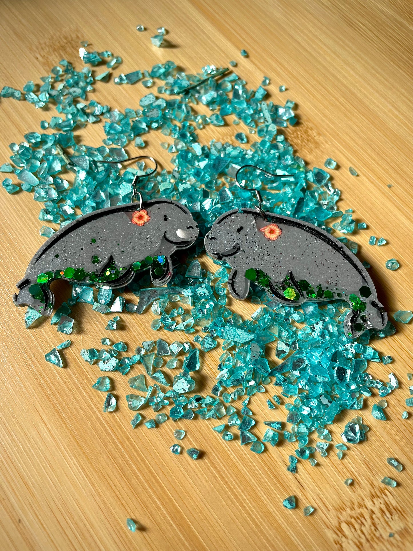 Manatee resin earrings